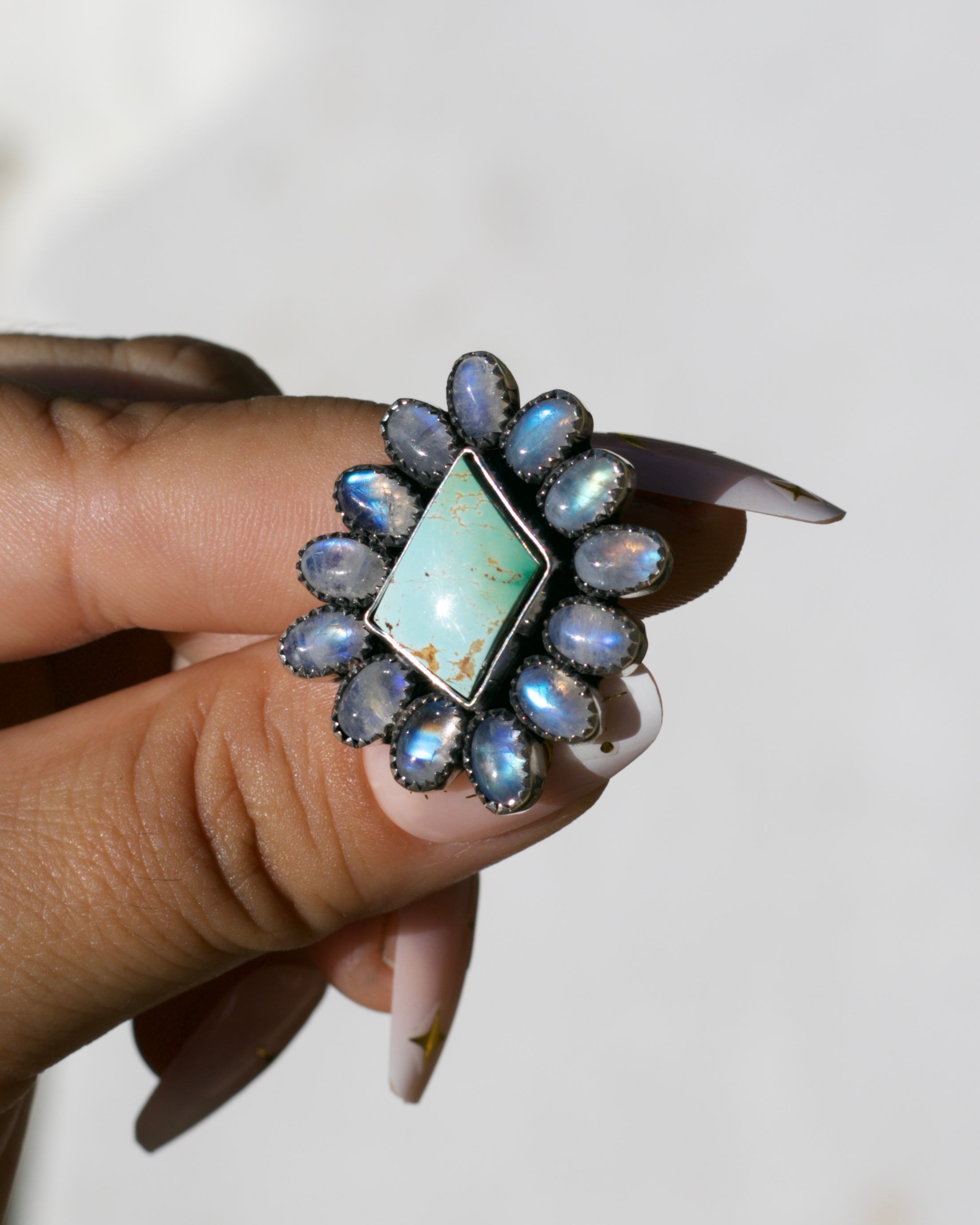 Moonlight Ring. Rainbow Moonstone and Pilot Mountain Turquoise. To be finished on your size
