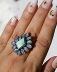Moonlight Ring. Rainbow Moonstone and Pilot Mountain Turquoise. To be finished on your size