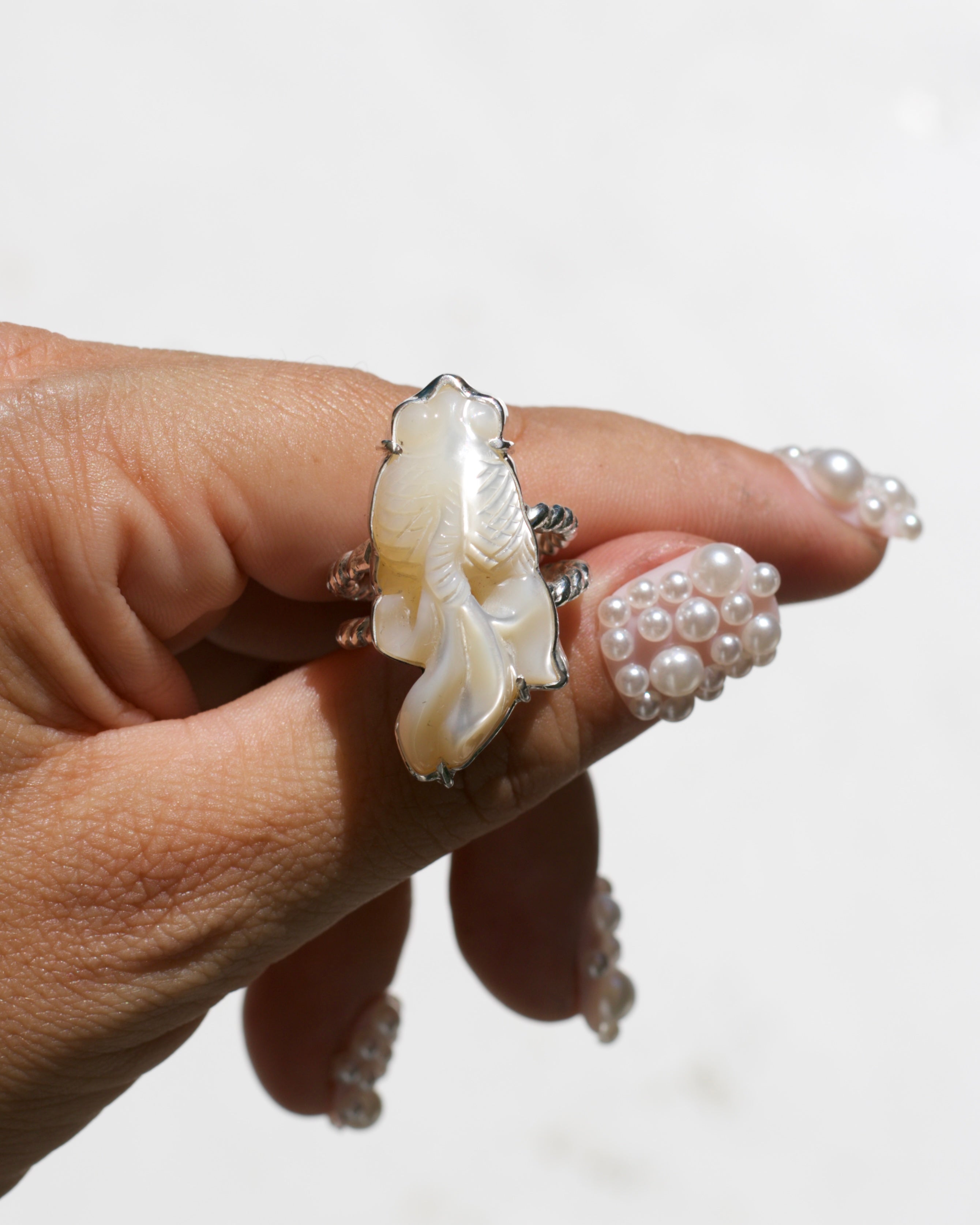 Carved Mother of Pearl Fish Ring