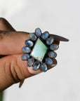 Moonlight Ring. Rainbow Moonstone and Pilot Mountain Turquoise. To be finished on your size