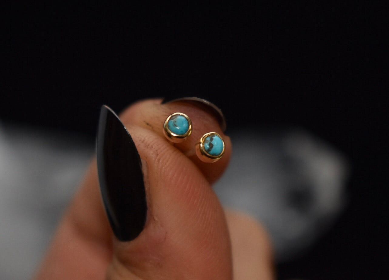 Turquoise and gold mini studs.
