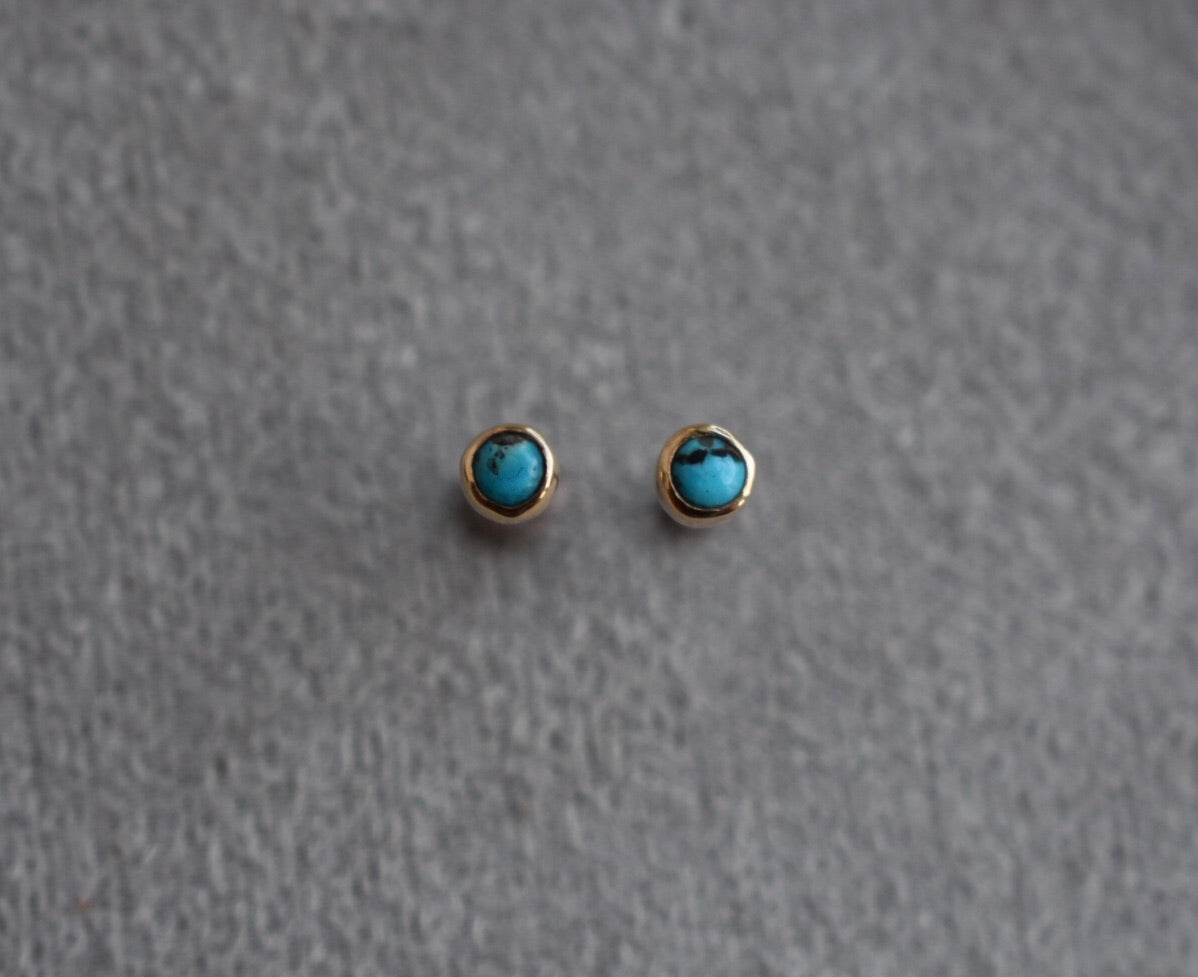 Turquoise and gold mini studs.